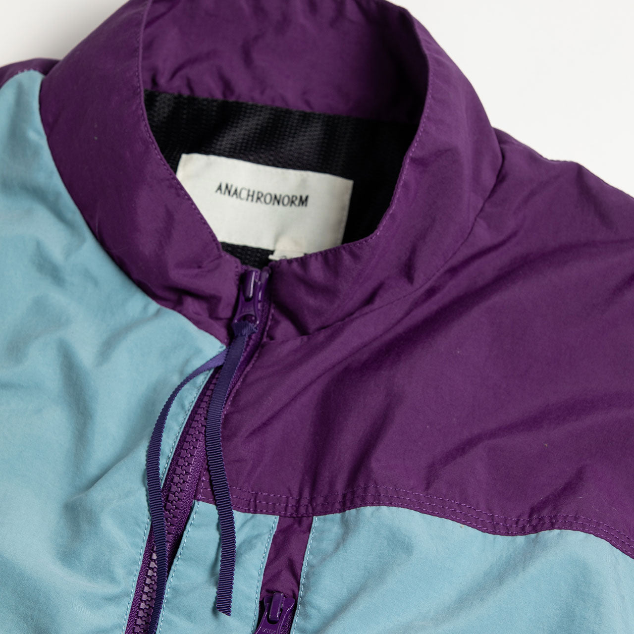 【ANACHRONORM】EXCHANGE PATTERN NYLON JACKET|AN387