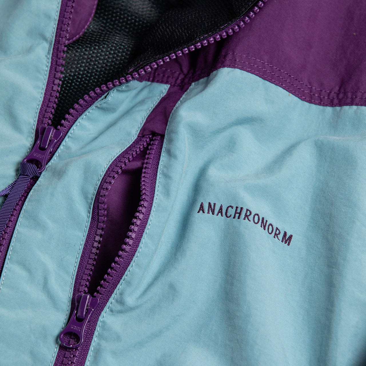 【ANACHRONORM】EXCHANGE PATTERN NYLON JACKET|AN387