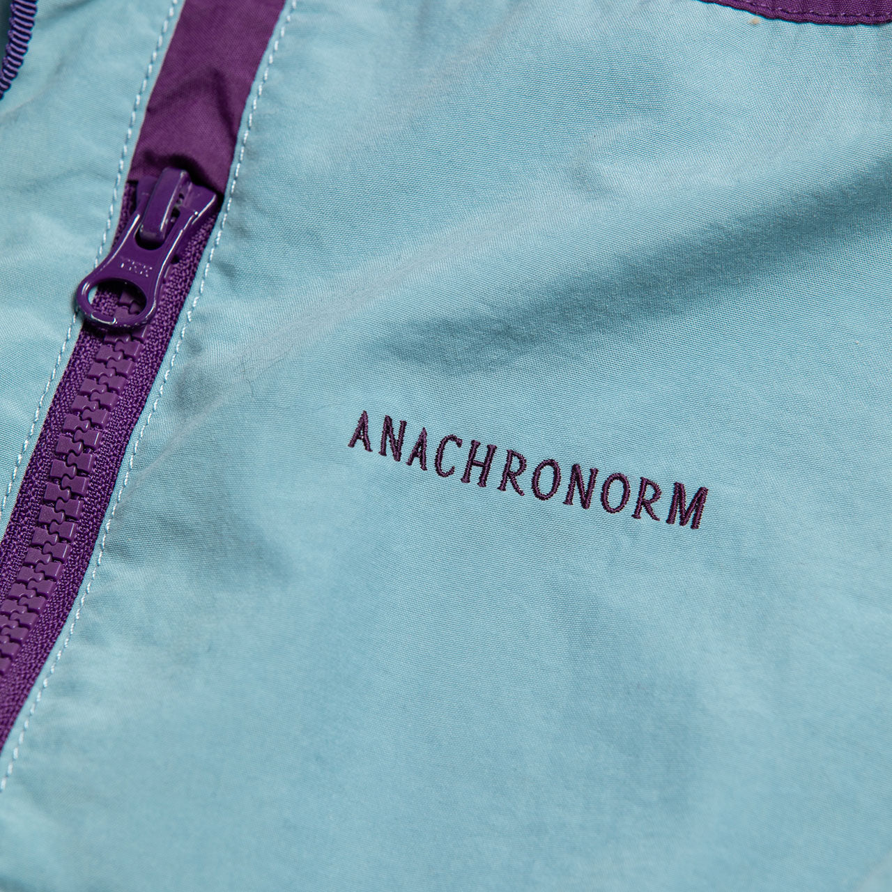 【ANACHRONORM】EXCHANGE PATTERN NYLON JACKET|AN387