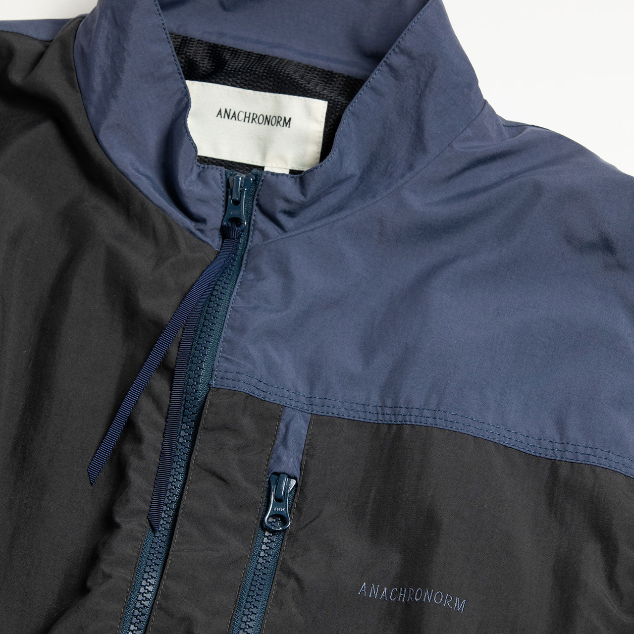 【ANACHRONORM】EXCHANGE PATTERN NYLON JACKET|AN387