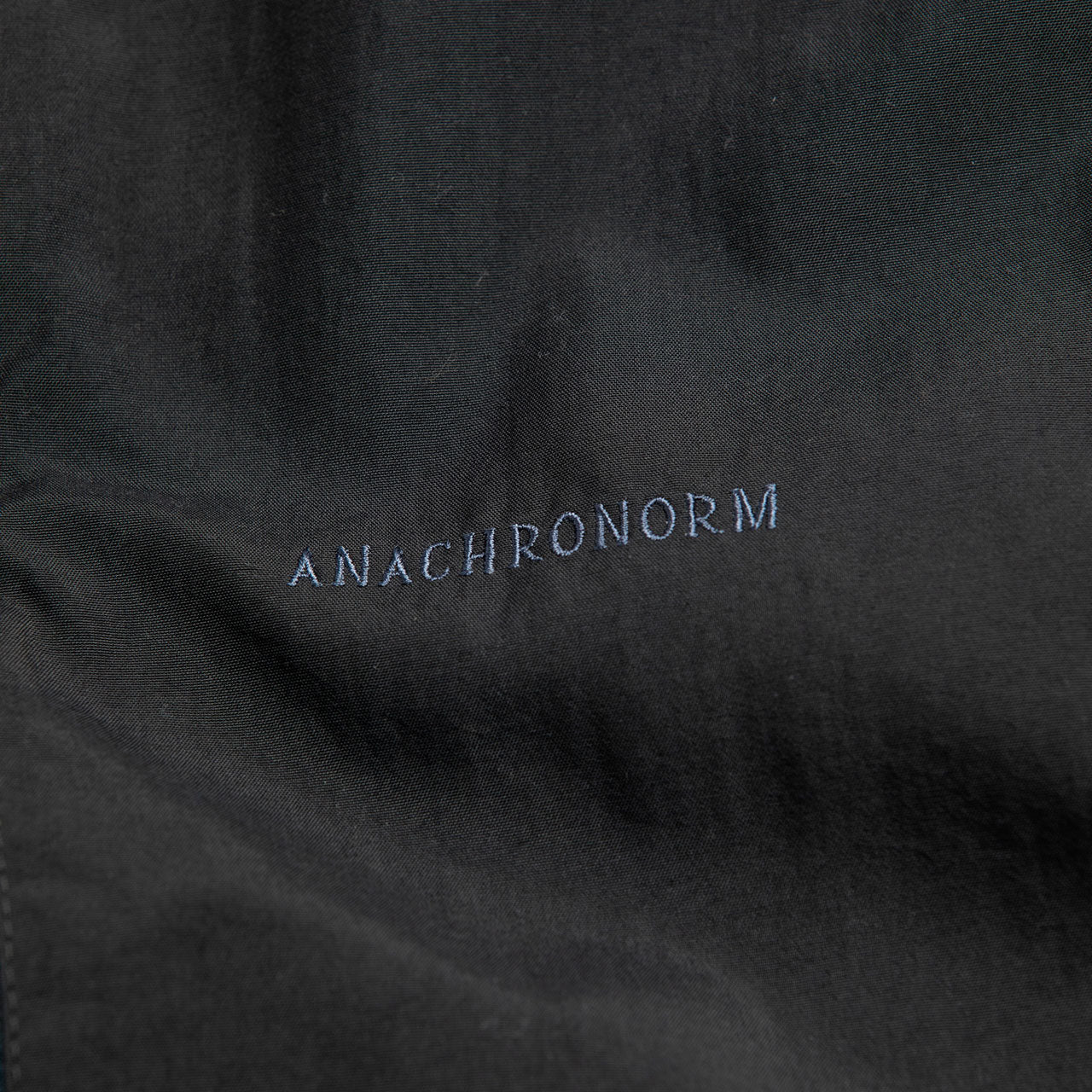 【ANACHRONORM】EXCHANGE PATTERN NYLON JACKET|AN387