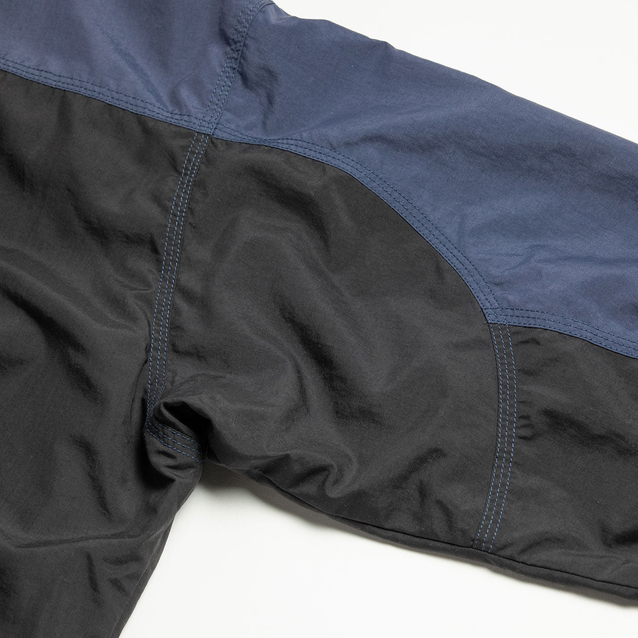 【ANACHRONORM】EXCHANGE PATTERN NYLON JACKET|AN387