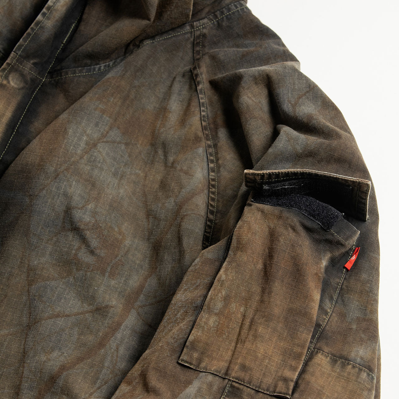 【ANACHRONORM】SULFUR DYED RIPSTOP REALTREE ECWCS TYPE PARKA JACKET SULFUR BLACK｜AN399-B